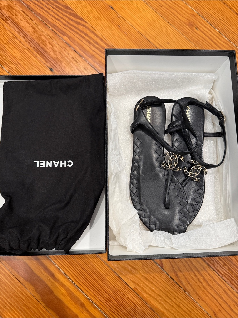 CHANEL Black Leather Quilted Toe-Post Sandals with Gold CC Chain